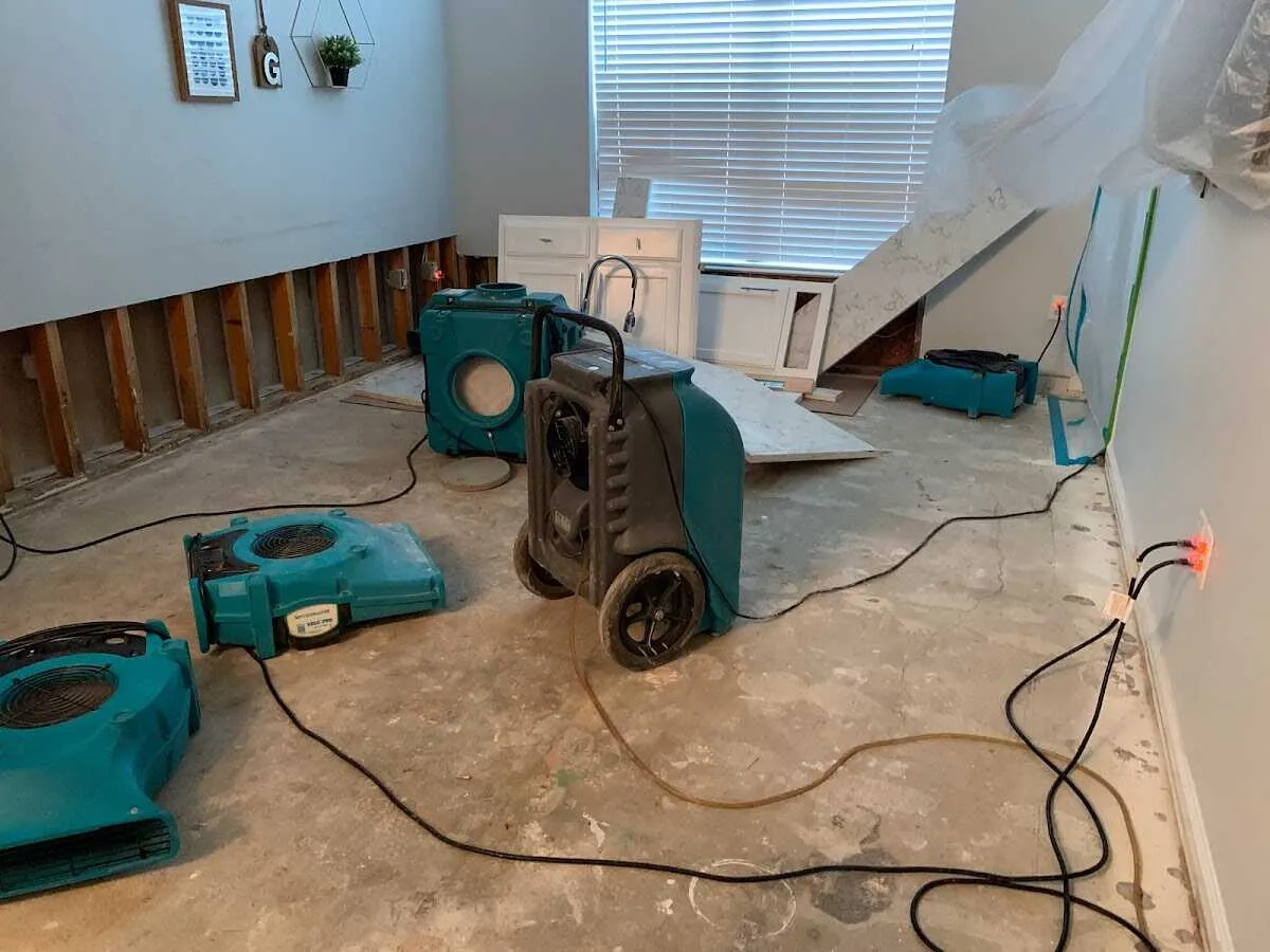 Dehumidifier in flood-cut room for Water Damage Restoration in Kosciusko